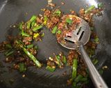 A picture of step 3 of Paneer capsicum schezwan.