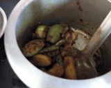 A picture of step 6 of Achari aloo parwal.