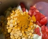 A picture of step 2 of Papaya and Chana Dal quick curry.