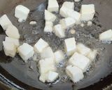A picture of step 5 of Cashew Curry.
