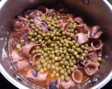 Foto del paso 5 de la receta: Chipirones con guisantes