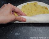 A picture of step 9 of Persian mashed potato wrap.