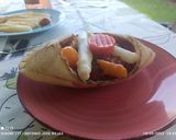 Foto del paso 6 de la receta: Fetuccini de espinacas con txangurro en salsa de tomate y txangurro con encurtidos