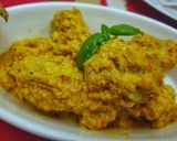 A picture of step 11 of Chicken in coconut and turmeric sauce.