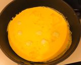 Foto del passaggio 3 della ricetta Peperoni ripieni di uova