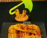 A picture of step 4 of Butter Garlicky Spicy Grilled Crispy Curly Corn Ribs - With Schezwan Dip Corn Ribs Monsoon Munching.