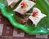 A picture of step 5 of Roti Roll with Cheese Spread.