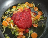 Foto del paso 5 de la receta: Merluza en salsa de tomate y chocolate