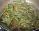 A picture of step 1 of Fried masala green peas.