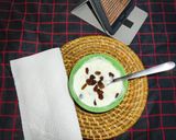 Foto del paso 3 de la receta Yogurt con uvas pasas y miel