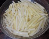 Foto del paso 5 de la receta Rollitos de cerdo con papas fritas y salsa a la pimienta