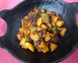 A picture of step 3 of Aloo Shimla mirch without onion garlic.