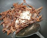 A picture of step 3 of Romaine lettuce with fried dace and black bean.