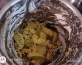 A picture of step 3 of Bhat karela pur with white sauce.