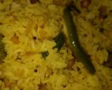 A picture of step 1 of Lemon rice with onions.