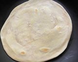 A picture of step 11 of Chicken Kathi Roll.