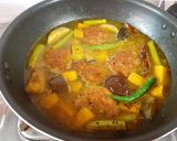 A picture of step 7 of Macher Dimer Borar Tok Jhol (Fish Roe Fritters in Tangy Curry).