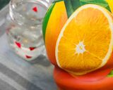 A picture of step 3 of Orangy Mango Cocktail.