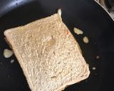 A picture of step 4 of Cheesy egg toast.