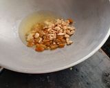 A picture of step 2 of Dry fruit gajar ka halwa.