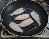 Foto del paso 3 de la receta: Chipirones a la plancha, con picada de ajo y perejil
