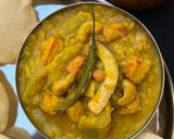 A picture of step 9 of Lau, Paneer diye Chola’r Dal (Chana Dal with Louki/ Bottle Gourd and Paneer/Cottage Cheese).
