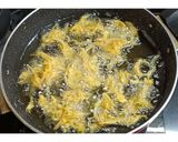 A picture of step 3 of Crispy Onion bhajiyas.