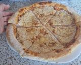 Előtésztás pizza recept fázis 7 fotója