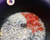A picture of step 3 of Panchmel Dal with steamed rice.