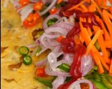 A picture of step 10 of Beloved Egg Chicken (Kathi) Roll.