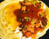 A picture of step 4 of Malabar paratha chicken sandwich.