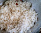 A picture of step 5 of Coconut rice.