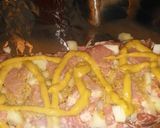 A picture of step 10 of Foil wrapped honey mustard pork loin with zucchini, squash, and baby carrots.