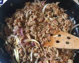 A picture of step 4 of Pasta with Spicy Sausage, Sun-dried Tomatoes & Basil.