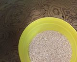 A picture of step 5 of Dodha Burfi with Daliya.