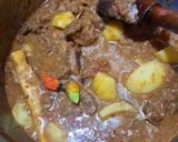 A picture of step 6 of Alu gosht.