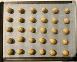 A picture of step 6 of Hazelnut Thumbprint Cookies.