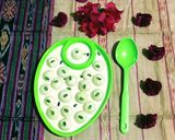 A picture of step 10 of Suji Ras Malai.