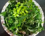 A picture of step 1 of Harive Soppu Bendi / Amaranth leaves curry.