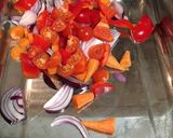 A picture of step 2 of Chop & chuck chicken & chorizo traybake.