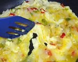 A picture of step 3 of Scrambled Eggs with Spiced Tomato Purée.