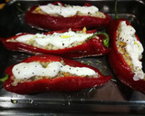 Foto del paso 12 de la receta: Pimientos rellenos con bacalao y arroz sobre salsa de tomate