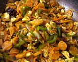A picture of step 14 of Schezwan Egg Sausage Noodles.