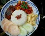 Foto langkah ke 3 dari resep Ikan Masak Kering Kayu Bakar Pelengkap Nasi Uduk/Nasi Kuning.