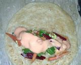 A picture of step 18 of Dynamite Chicken roll.