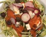 A picture of step 4 of Zucchini Spaghetti with Tomato Sauce, Kalamata Olives, Feta, and Radishes.