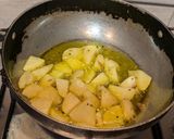 A picture of step 5 of Aloo Posto (Potatoes cooked with poppy seed paste).