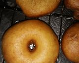 A picture of step 2 of Doughnut coated in sugar.