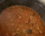 A picture of step 4 of Goat meat Jollof rice.