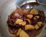A picture of step 5 of Aloo Akni.